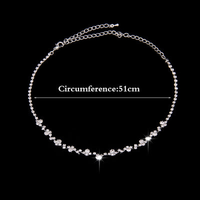 Simple rhinestone bridal necklace and matching drop earrings set, perfect for a wedding or formal occasion. - Image 3