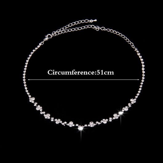 Simple rhinestone bridal necklace and matching drop earrings set, perfect for a wedding or formal occasion. - Image 3