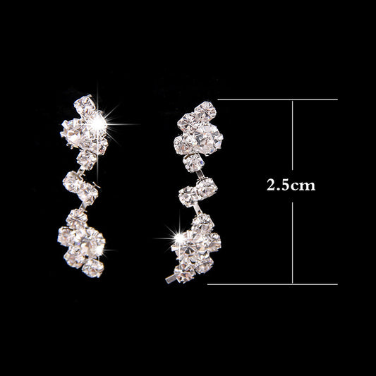 Simple rhinestone bridal necklace and matching drop earrings set, perfect for a wedding or formal occasion. - Image 2