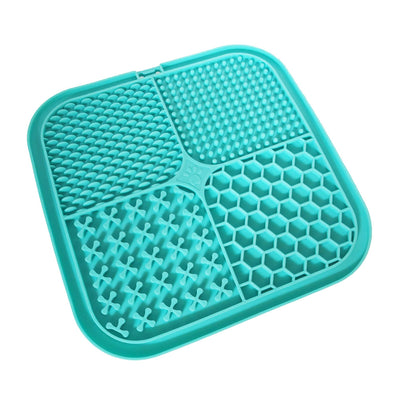 Gray silicone pet licking pad with four textured sections, designed for slow feeding and anti-choking. - Image 35