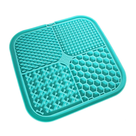 Gray silicone pet licking pad with four textured sections, designed for slow feeding and anti-choking. - Image 35