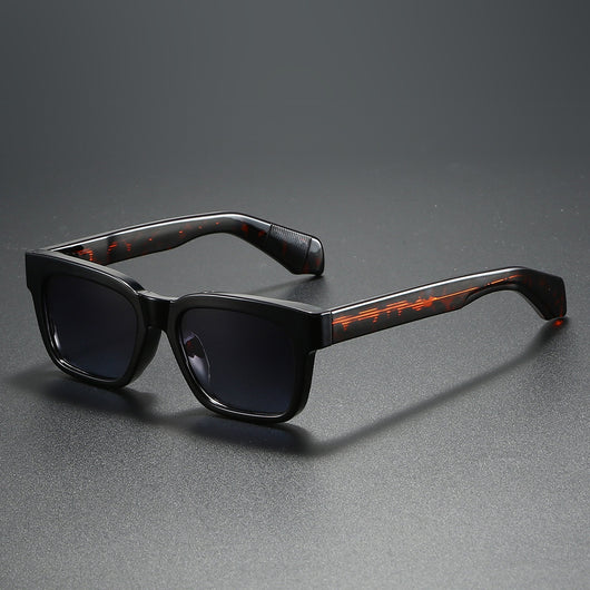 Black square-frame sunglasses with bright orange polarized lenses, designed for outdoor driving and anti-glare. - Image 18