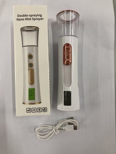 White and rose gold double-spraying nano mist sprayer with a clear reservoir, next to its product box and USB cable. - Image 13