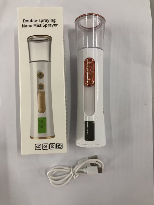 White and rose gold double-spraying nano mist sprayer with a clear reservoir, next to its product box and USB cable. - Image 13