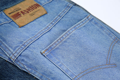 Jeans Vintage Deconstruido con Parches Pesados Lavado Retro - Image 9