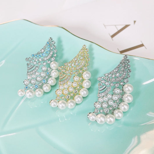 Aretes de Perla Elegantes con Zirconia y Diseño Ondulado - Image 5