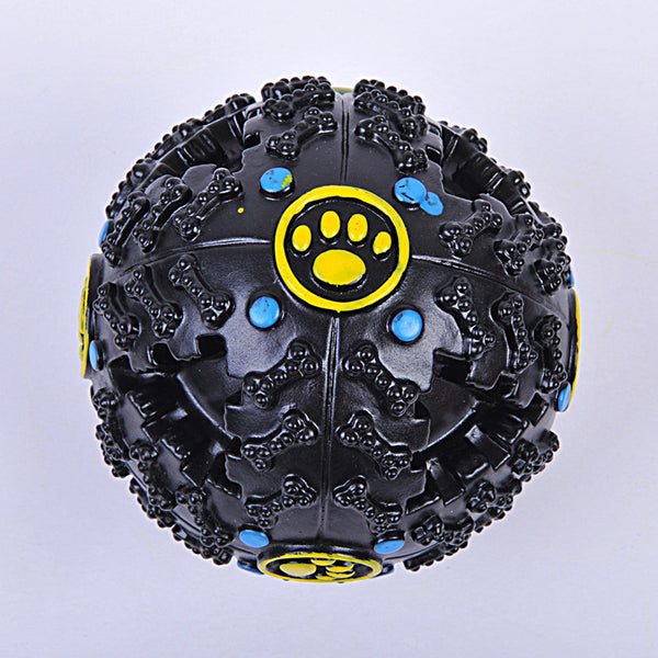 Blue rubber dog toy ball with bone-shaped nubs, red dots, and yellow paw print accents, designed for treats. - Image 3