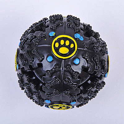 Blue rubber dog toy ball with bone-shaped nubs, red dots, and yellow paw print accents, designed for treats. - Image 3
