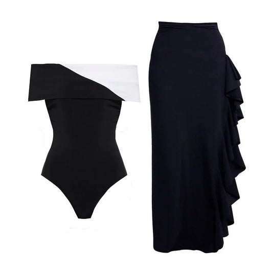 Black one-piece swimsuit with a deep V-neckline and white horizontal stitching detail across the plunge. - Image 32
