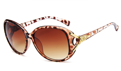 Brown oversized women's sunglasses with gradient lenses and gold-tone fox head embellishments on the temples. - Image 8