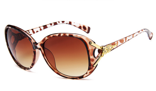 Brown oversized women's sunglasses with gradient lenses and gold-tone fox head embellishments on the temples. - Image 8
