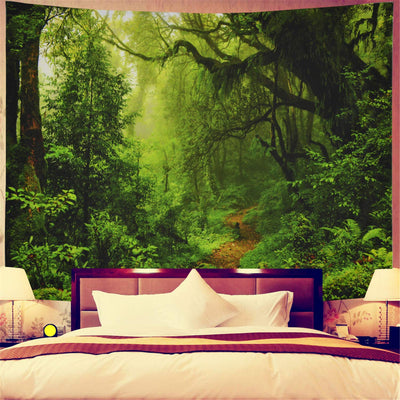 Printed tapestry featuring a lush green jungle scene with tall trees, dense foliage, and a winding path.