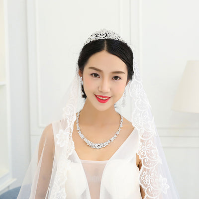 Silver-toned rhinestone necklace and matching dangle earrings set, featuring a sparkling floral cluster design. - Image 5