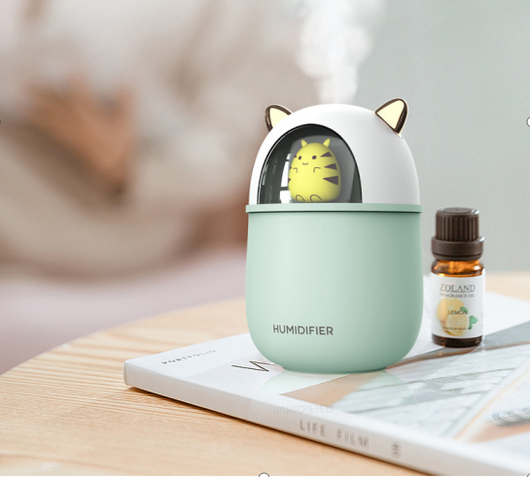 Pink portable USB humidifier shaped like a cat, with metallic pink ears and a white cat face inside a clear dome. - Image 9