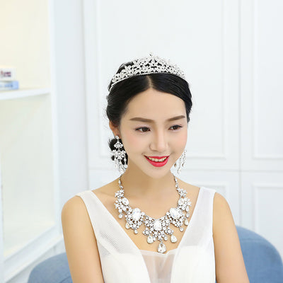 Sparkling rhinestone and crystal bridal jewelry set with a statement necklace and matching chandelier earrings. - Image 3