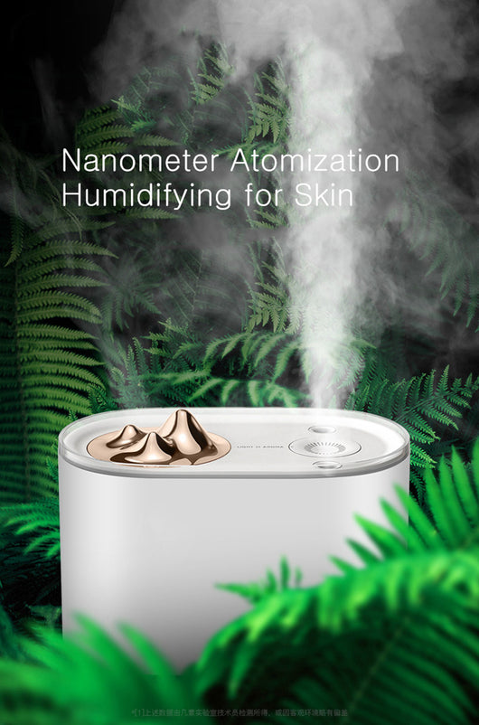 White portable humidifier with rose gold mountain-shaped mist outlet, 1000ml capacity, and compact design. - Image 7