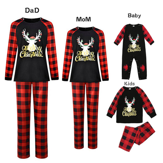 Matching family Christmas pajamas in green with a festive pattern of Santa, reindeer, and Christmas trees. - Image 18