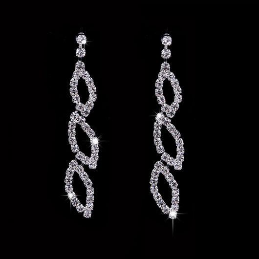 Sparkling silver-toned necklace and matching dangle earrings set with marquise-shaped rhinestone links. - Image 2
