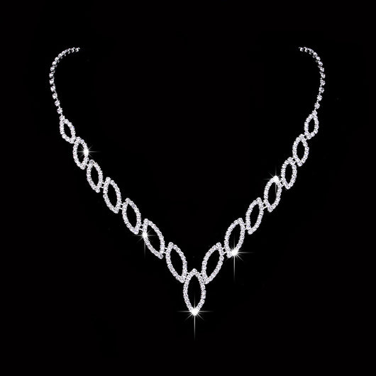 Sparkling silver-toned necklace and matching dangle earrings set with marquise-shaped rhinestone links. - Image 4