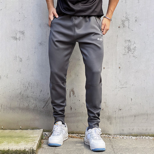 Pantalones de Chándal con Bolsillos de Cierre y Tela Elástica - Image 5