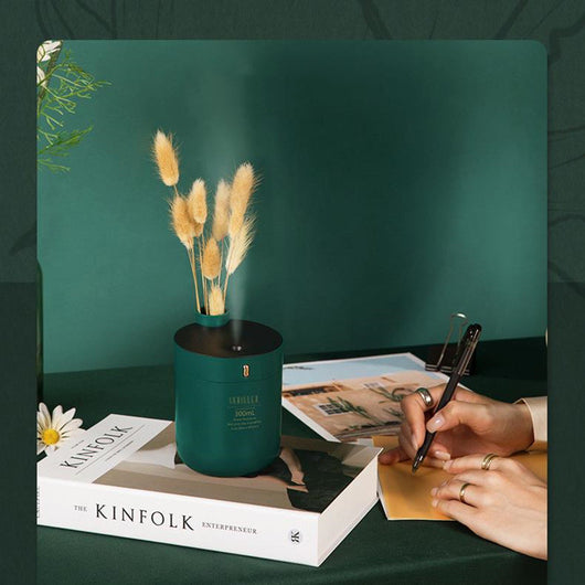 Dark green cylindrical humidifier with a black top, 300mL capacity, and a single control button. - Image 3