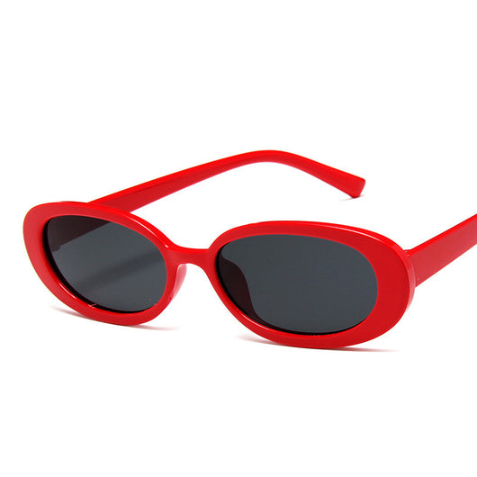 Small frame oval sunglasses with a tortoiseshell pattern and brown lenses on a white background.