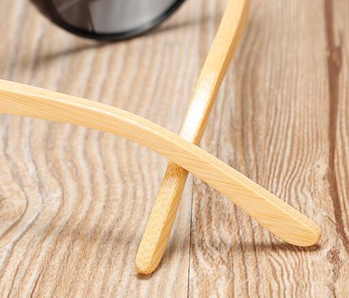 Round black frame sunglasses with gray lenses and light wood bamboo temples, shown from multiple angles. - Image 10