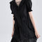 Vestido Negro Elegante con Lazos y Volantes