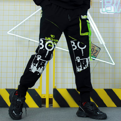 Pantalones Holgados con Detalles de Costura y Cordones Decorativos