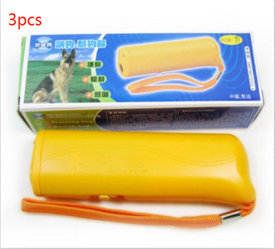 Yellow and black ultrasonic dog training devices with wrist straps, one in retail packaging. - Image 15
