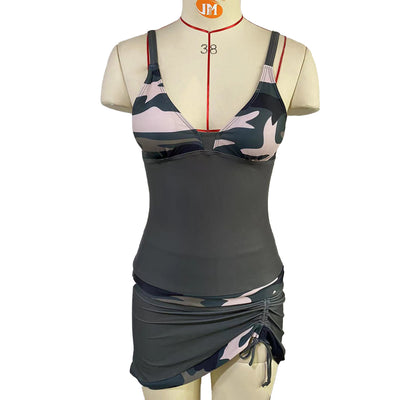 Women's two-piece swimsuit featuring a V-neck tankini top with camouflage print bust and dark grey body, paired with a matching ruched swim skirt. - Image 9