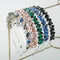 Diadema Retro Francesa con Textura Metálica y Cristales Brillantes