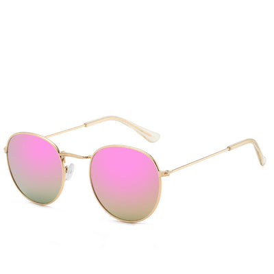 Round gold-framed sunglasses with pink tinted lenses, featuring clear temple tips. - Image 6