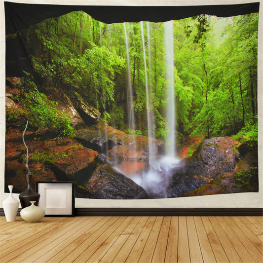 Large wall tapestry featuring a vibrant green forest with a cascading waterfall over rocks, displayed in a room. - Image 2