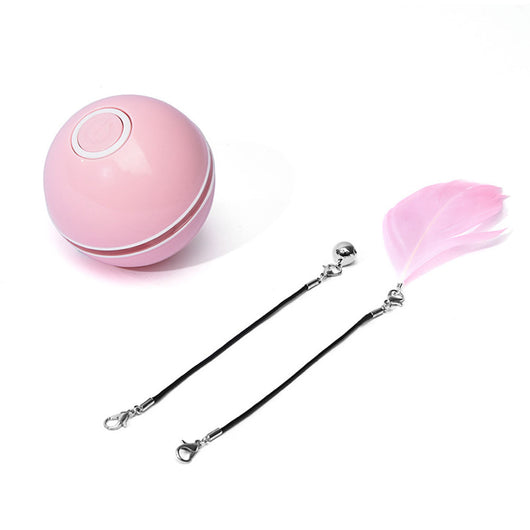 White and black self-rotating cat toy with an orange ball on a flexible rod, showing motion blur. - Image 11