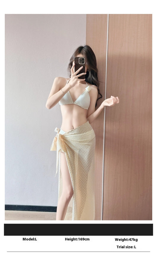 Women's light purple three-piece bikini set with a triangle halter top, bottoms, and a mesh sarong with rose details. - Image 13