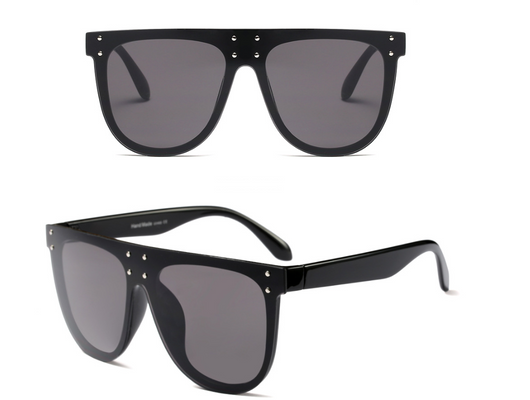 Black and white flat top sunglasses with dark lenses and small gold-toned stud details on the frame. - Image 8