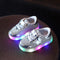 Zapatos con Botón Mágico LED