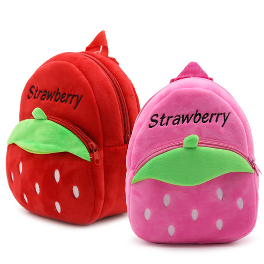 Red plush strawberry backpack for toddlers with green leaf accents, white 'seeds', and adjustable straps.