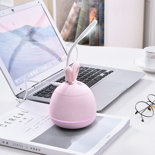 Cute pink rabbit desktop mini USB humidifier with a silver band, featuring a compact egg shape and bunny ears. - Image 4