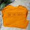Camiseta Unisex Estampado 'BE THE LIGHT' - Casual y Versátil