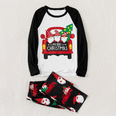 White and black raglan long-sleeve Christmas pajama top with red truck and gnome graphic, black gnome print pajama pants. - Image 9