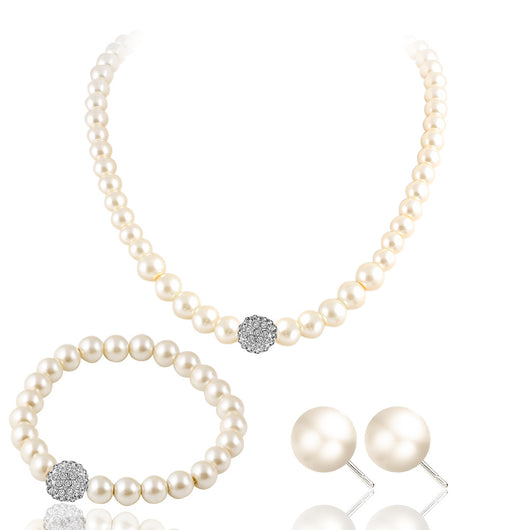 White pearl necklace, bracelet, and stud earrings set with pave crystal ball accents, displayed on a black stand.