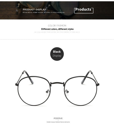 Retro oval anti-blue light glasses with a dark metal frame and clear lenses on a white background. - Image 12