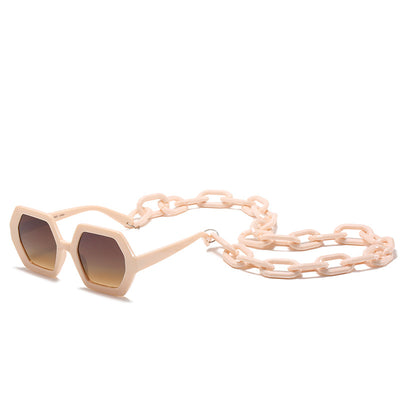 Octagonal sunglasses with brown gradient lenses and a tortoiseshell chain strap on a white background. - Image 6