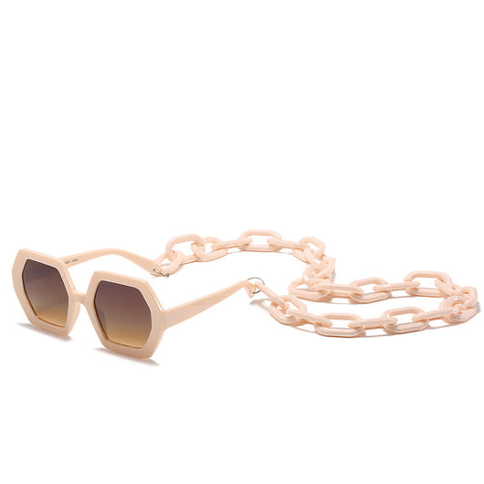 Octagonal sunglasses with brown gradient lenses and a tortoiseshell chain strap on a white background. - Image 6