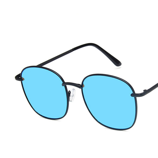 Gold metal round sunglasses with dark gray resin lenses and black temple tips on a white background. - Image 9