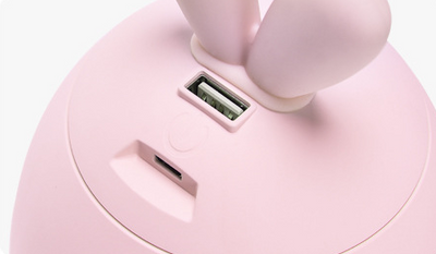 Cute pink rabbit desktop mini USB humidifier with a silver band, featuring a compact egg shape and bunny ears. - Image 3