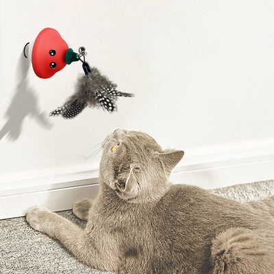 Red and white mushroom-shaped cat toy with cartoon eyes, a green loop, and a suction cup base, showing dimensions. - Image 5