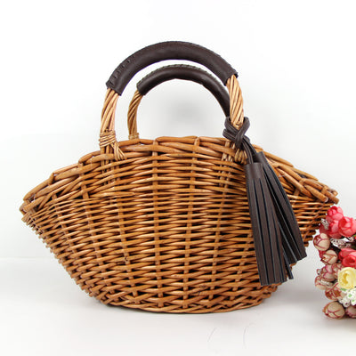 Bolsa de Mano Tejida en Ratán con Borlas - Estilo Bohemio Artesanal